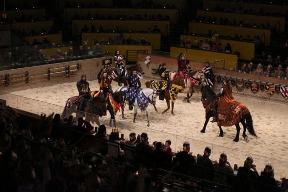 Medieval Times, a family dinner theater, features staged medieval-style games, sword fighting, and jousting performed by a cast of 75 actors and 20 horses, held in Lyndhurst, New Jersey. Each location of the organization is housed in a replica 11th-century castle.